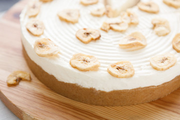 Delicious banana cake on table