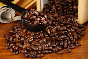 Coffe beans on a spoon  