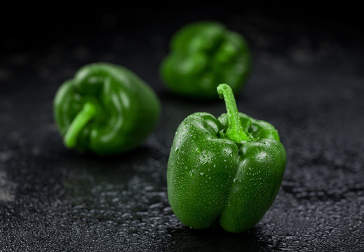 Healthy Paprika (green) on a vintage slate slab (close-up shot; selective focus)