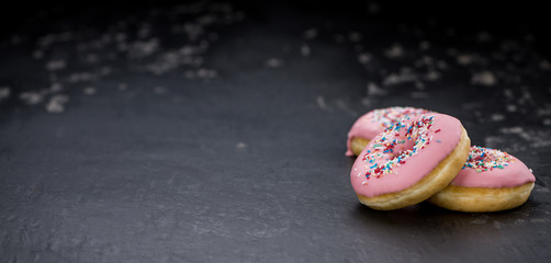 Pink glazed Donuts (close-up shot)