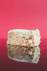 Esterhazy cake slice on mirror table