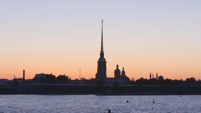 Silhouette of Peter and Paul Fortress in the sunset sky - St. Petersburg, Russia