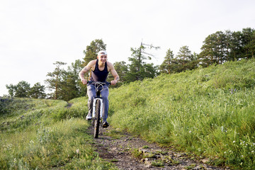 Man travelling on a bicycle