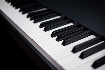 Naklejka premium Close up view of piano keys