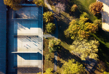 Tennis court in a park aerial view