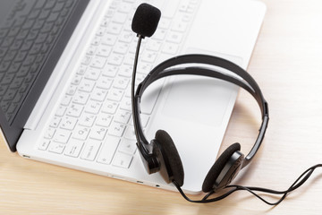 headset on keyboard computer laptop