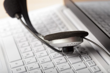 headset on keyboard computer laptop
