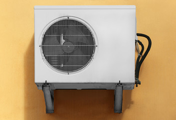 Fototapeta premium Air conditioner on wall of building outdoors