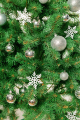 Christmas tree with ornaments, close-up