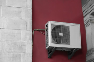 Air conditioner on wall of building, outdoors