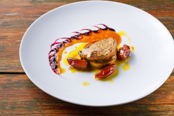 Roasted goose liver with date fruit and apple