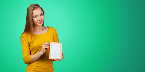 young woman holding sign board