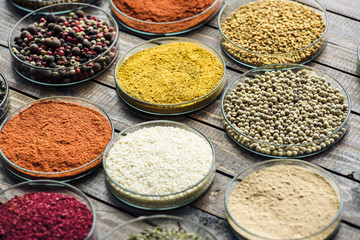 glass bowls with different colorful spices