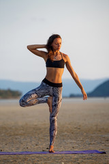 Beautiful girl practicing yoga