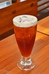 A glass of bubble tea on table.