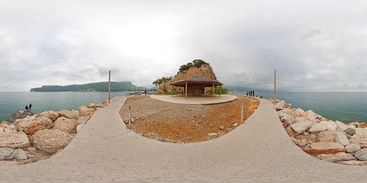 360 degree spherical panorama from Turkey, Antalya, Kemer. Cape of Yoruk park. Seascape with alcove, seafront, stones, fisherman, sea, clouds, mountains, hills. Hdri map