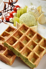 Waffle with ice cream on plate   
