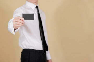Man showing black card. Leaflet presentation. Pamphlet hold hands. Man show clear offset paper....