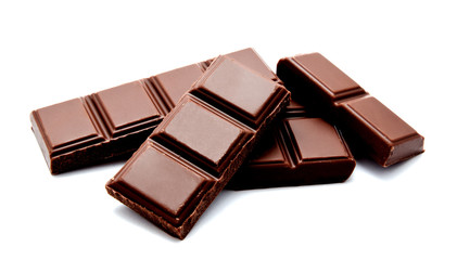 Dark milk chocolate bars stack isolated on a white