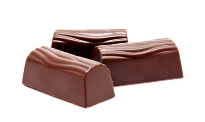 Assortment of chocolate candies sweets isolated on a white