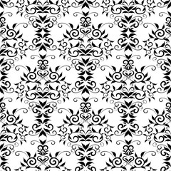 Vintage floral damask seamless pattern. Black white vector background with hand drawn elegance flowers, swirl leaves, line art tracery flourish ornaments. Luxury flowery design.Isolated floral texture