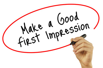 Man Hand writing Make a Good First Impression with black marker on visual screen. Isolated on...
