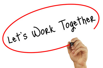 Man Hand writing Lets Work Together with black marker on visual screen. Isolated on background....