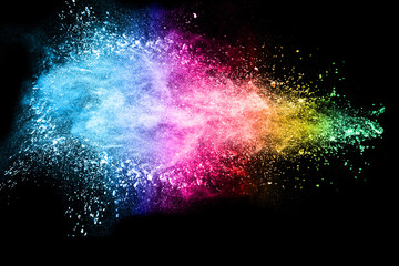 abstract color powder explosion on  black background.abstract  Freeze motion of color powder splash.