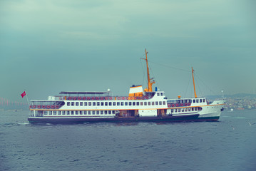 Fototapeta premium The ship carries passengers along the Bosporus Strait. 