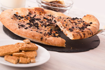 Sweet chocolate pizza with cookies. 