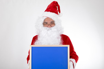 Santa claus holding blue billboard in hand on white background