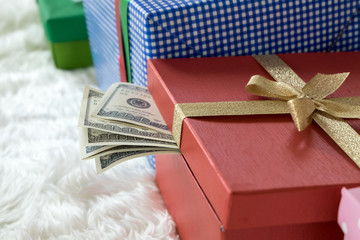 Money dollars in a gifts box