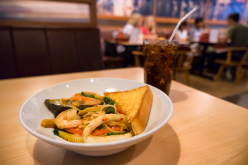 Seafood pasta spaghetti sauce and intense spicy , delicious style italian in restaurant