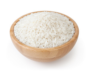 White long-grain rice in wooden bowl isolated on white background with clipping path