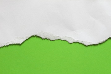 Pieces of colored torn paper as a background. copy space
