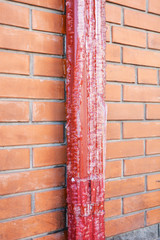 Frozen Gutter or Downspout. Gutters and Downspouts Sometimes Freeze into Solid Blocks of Ice. Bad rain gutter cleaning.