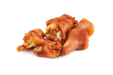 The tail pig cooked on a white background