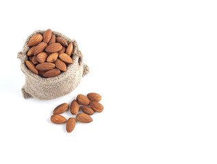 Almonds seeds, Almonds in sack  isolated on over white background