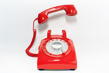 Retro rotary dial phone on call with no body, hang up by hollow man