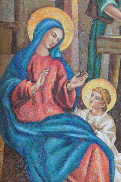 LONDON, GREAT BRITAIN - SEPTEMBER 17, 2017: The detail of Hl. Mary from  the mosaic of Holy Family in St. Peter Italian church from 20. cent.