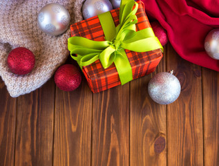 Christmas tree toys on a wooden table. Preparation for the New Year
