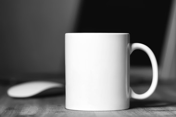 White mug on the desktop