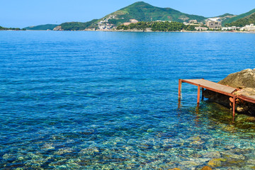 The sea view. Quiet sea with an island. Montenegro