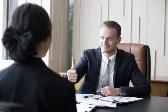 Businessman interview woman for work at office. Man working Concept