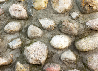 A natural stone. They are cemented together.
