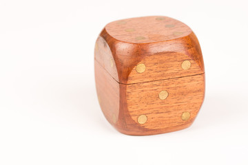 Wooden gambling dice isolated above white background, gambling or luck concept
