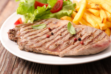 grilled steak and french fries
