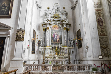 Fototapeta na wymiar Altar inside the Duomo Nuovo or New Cathedral, largest Roman Catholic church in Brescia, Italy