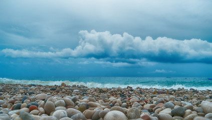 Obraz na płótnie Canvas sea pebbles on the background of the sea