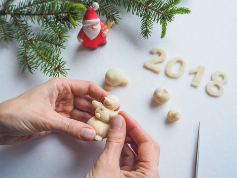 Snowman building closeup. Christmas concept 2018.
